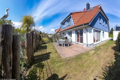 Image de Top Ferienhaus, Zentral, Ruhige Lage, Geräumig, Hell, Sauna, 5 x Tv, Strandkorb