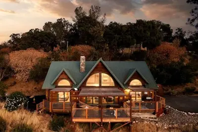 Image de TimberTales - A cozy log cabin with magical lakeviews
