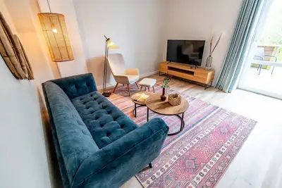Image de Renovierte Ferienwohnung mit GroĂźzĂĽgiger Terrasse und Gartenteil