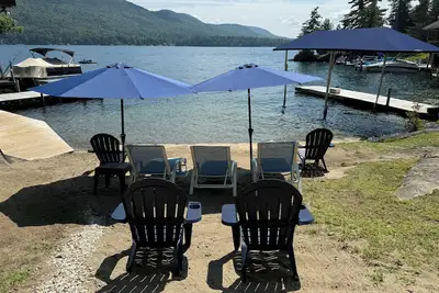 Image de Lakefront luxury, Lake George log cabin home with your own private sandy beach