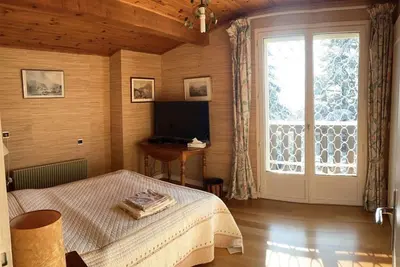 Image de Appartement meublé 65m² en chalet - linge & ménage hebdo - jardin - parking