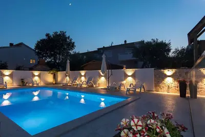 Image de Appartement de vacances avec piscine d'eau salée chauffée