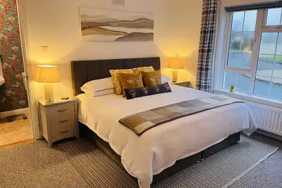 Image de One Bedroom Self-Contained Apartment. (King or Twin)