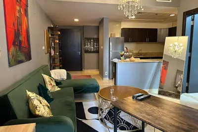 Image de Résidence rouge 1 Br Sports City à bas prix près du siège de l'Icc
