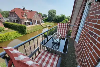 Image de GemĂĽtliche Wohnung Grachtenidyll Og an den Greetsieler Grachten