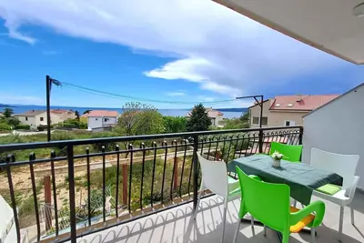 Image de Appartement de vacances avec climatisation et vue sur la mer
