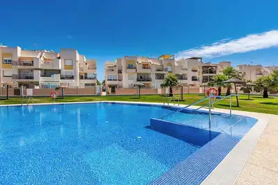 Image de Appartement de vacances \"El Toyo\" avec piscine partagée, terrasses privées et Wi-Fi