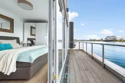 Image de Schwimmendes Haus - An Bord Zwei - Schwimmendes Haus An Bord 2, Sauna, Bootsanleger, Meerblick