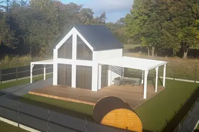 Image de Ferienhaus 70qm bis 5 Gäste, Sauna, Whirlpool, 75qm Terrasse Eingezäuntem Garten