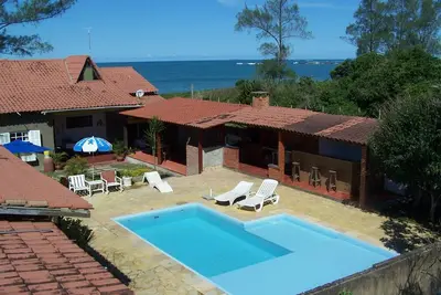 Image de Casa de Seis SuĂtes, um Quarto e Duas Salas. ParaĂso na Beira do mar