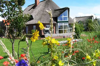 Image de Ferienwohnung Hass - Ferienwohnung Reethaus in Tönning
