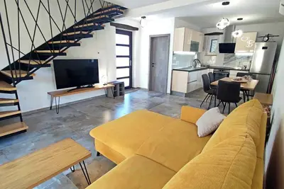 Image de Maison de vacances avec un balcon