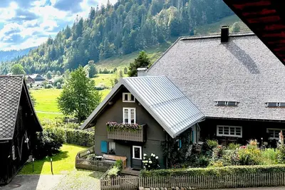 Maison de vacances \"Backhüsli Am Bauerngarten\" avec vue sur les montagnes, terrasse privée et Wi-Fi