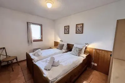 Image de Chalet pour 10 personnes nouvellement rénové situé directement sur les pistes