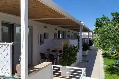 Image de Casa \"lu Iento\" à Otranto, logement dans la région de Baia dei Turchi entouré de verdure