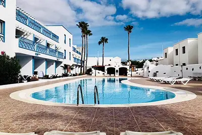 Image de Bel appartement avec piscine, Ă seulement 200m de la mer Ă Puerto del Carmen