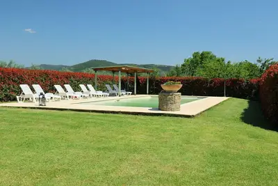Image de Joli appartement dans une maison de vacances avec Wifi, piscine, Tv, patio et parking