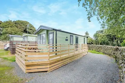 Image de This 2 bedroom caravan sleeps 4 people in one double and one twin bedroom.