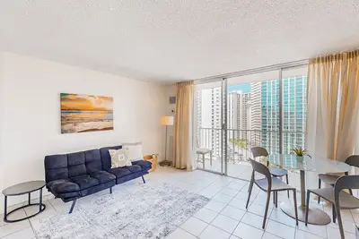 Mountain/city-view condo with rooftop pool, balcony, & W/D - 30-night minimum