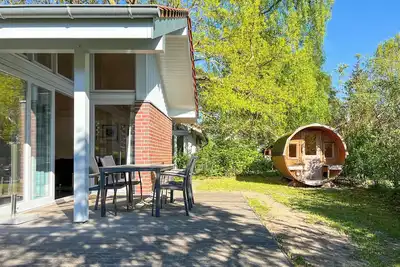 Image de Ferienhaus Wiesengeflüster W3 mit Fasssauna und Garten, 300 m zur Müritz