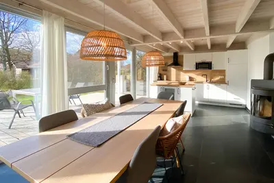 Image de Ferienhaus Wiesengeflüster E2 nur 3 Gehminuten zur Müritz und mit Sauna