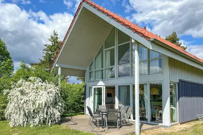 Image de Ferienhaus WiesengeflĂĽster S1 mit Sauna, Kamin und Workation an der MĂĽritz