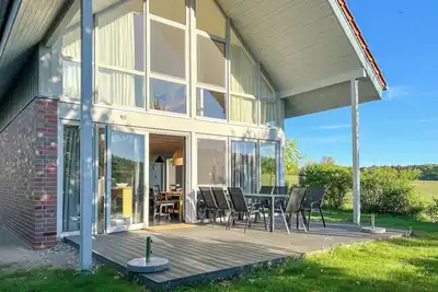 Image de Ferienhaus Wiesengeflüster E5 Gruppenfreundlich in Randlage mit Fasssauna