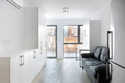 Image de #193 Cozy Studio with Rooftop Terrace