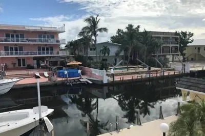 Image de Beautiful Canal front Home with Above Ground Pool, Dock and Fish Cleaning Station