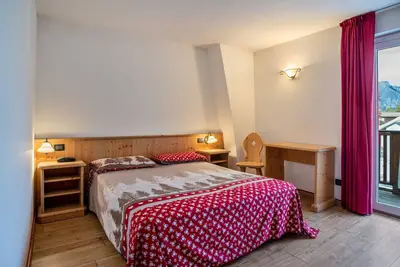 Image de Appartement 'Giongo Residence Aparthotel 103' avec vue sur la montagne, terrasse partagée et Wi-Fi