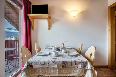 Image de Appartement 'Giongo Residence Aparthotel 203' avec vue sur la montagne, terrasse partagée et Wi-Fi