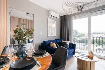 Cozy apartment surrounded by greenery and sea bree