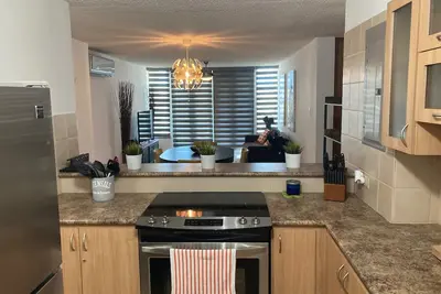 Image de Your Cozy Combate beach retreat, 2 bed/2bath, full A/C, free laundry