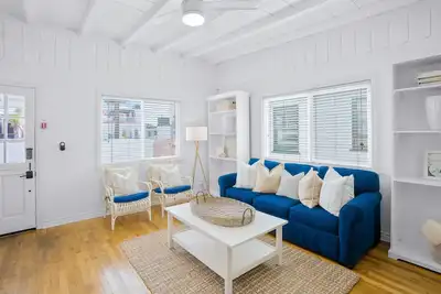 Image de Second-story beach cottage with a furnished deck, Ac, W/D, & garage parking