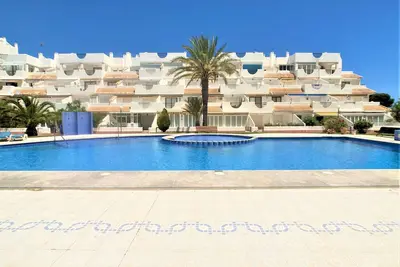Image de Appartement spacieux avec vue, piscine, aire de jeux, parking et court de tennis à Tomás Maestre.