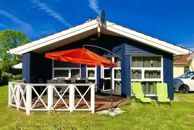 Image de GemĂĽtliches Holzhaus mit Maritimem Flair. Nur 200m zum Strand!