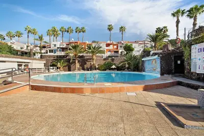 Image de Maison de vacances 'Harmony Vista Faro' avec piscine partagée, terrasse privée et Wi-Fi