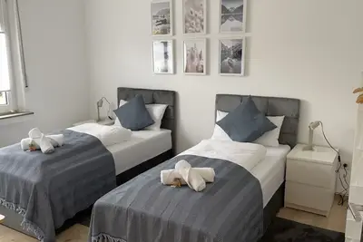 Image de Fewo54 Apartment mit Garten und Terrasse Smarttv/free Wifi/free Parking/