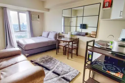Image de a cozy studio unit located at the city center near shopping and restaurant areas