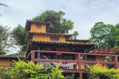 Image de Maison Bardot Forno Vista Mar para 7 em condomĂnio com piscina em frente a praia