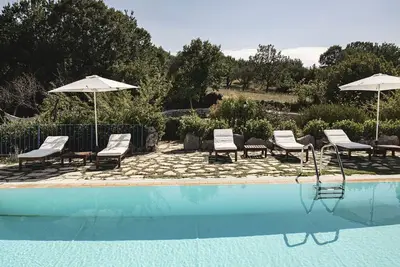 Image de Amazing trulli on the edge of a forest - Ideal for group - Pool - Bike rental