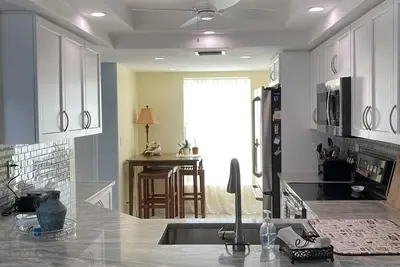 Image de 1st Floor Condo with community pool & 1 dedicated carport space