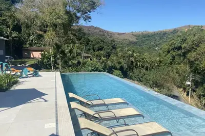 Image de Casa Angra Portogalo 4 SuĂtes Alto PadrĂŁo Piscina e Lazer Completo Privativo