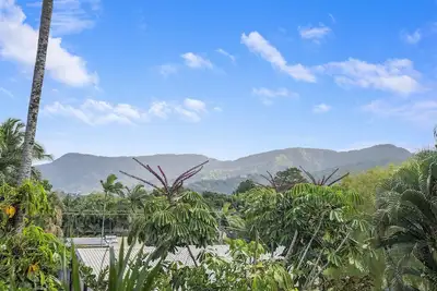 Image de Refreshed Family Home with Large Deck and Tropical Mountain View