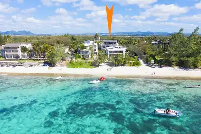 Image de penthouse sur la plage de belle mare, ascenseur privé, belle vue mer, piscine