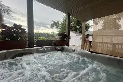 Image de Pristine 3bed, 3bath 1 min walkto the beach water amusement park. Hot Tub 5 TVs