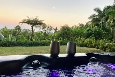 Image de New -The Sugar Shack, Ocean views over cane fields from your outdoor Spa Bath
