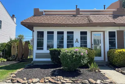 Image de Sandy toes Coastal Getaway-walk to the beach! \n#beach#surf#barrierisland