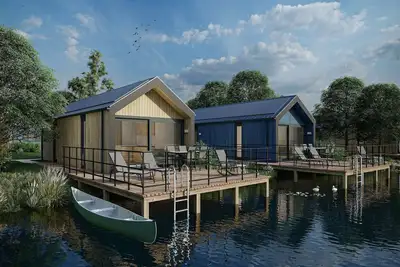 Image de Lodge aquatique moderne avec climatisation, près du Maasduinen