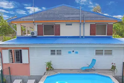 Image de Homerez - Appart. au Moule, piscine partagée